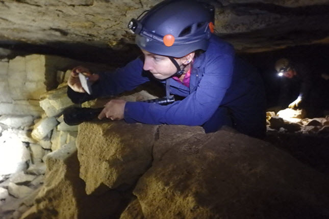 Shively exploring a Bat Cave.